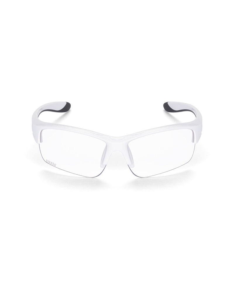Gafas deportivas infantiles BIKKOA JUNIOR con montura blanca y lente transparente protectora ideal para interior o poca luz, vista frontal con lente transparente protectora ideal para interior o poca luz, diseño multideporte para ciclismo, running o deportes escolares - Protectora