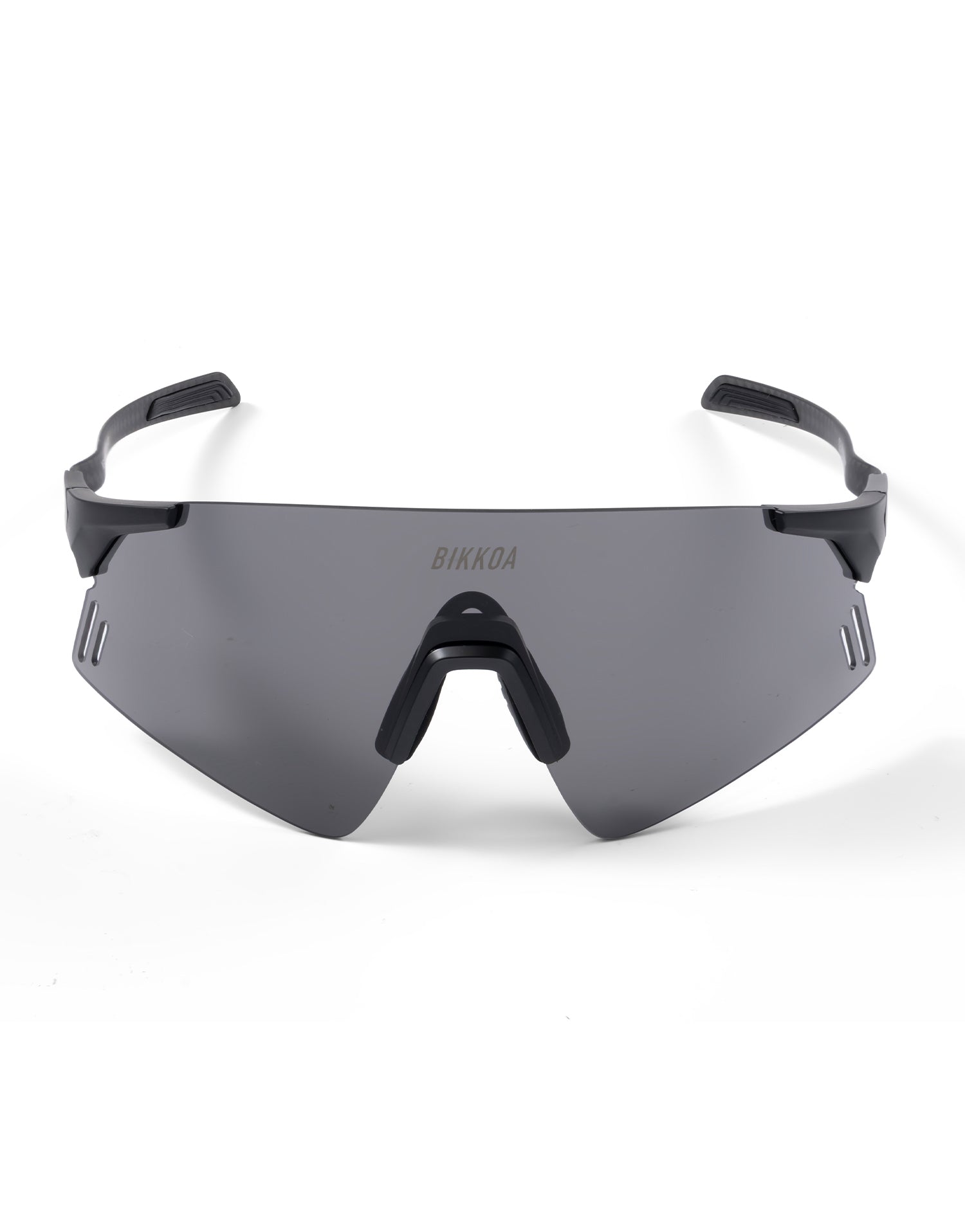 Vista frontal de las gafas BIKKOA NEXORA con lente negra deportiva - Negro